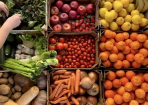Open Food Network image of produce boxes with carrots, tomatoes, lemons and oranges